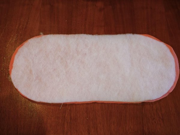 겹친 천 꿰매기